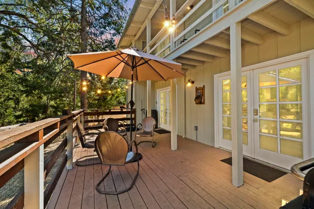 a view of balcony with chairs