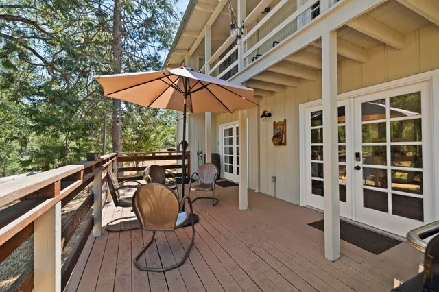 a balcony view with a seating space