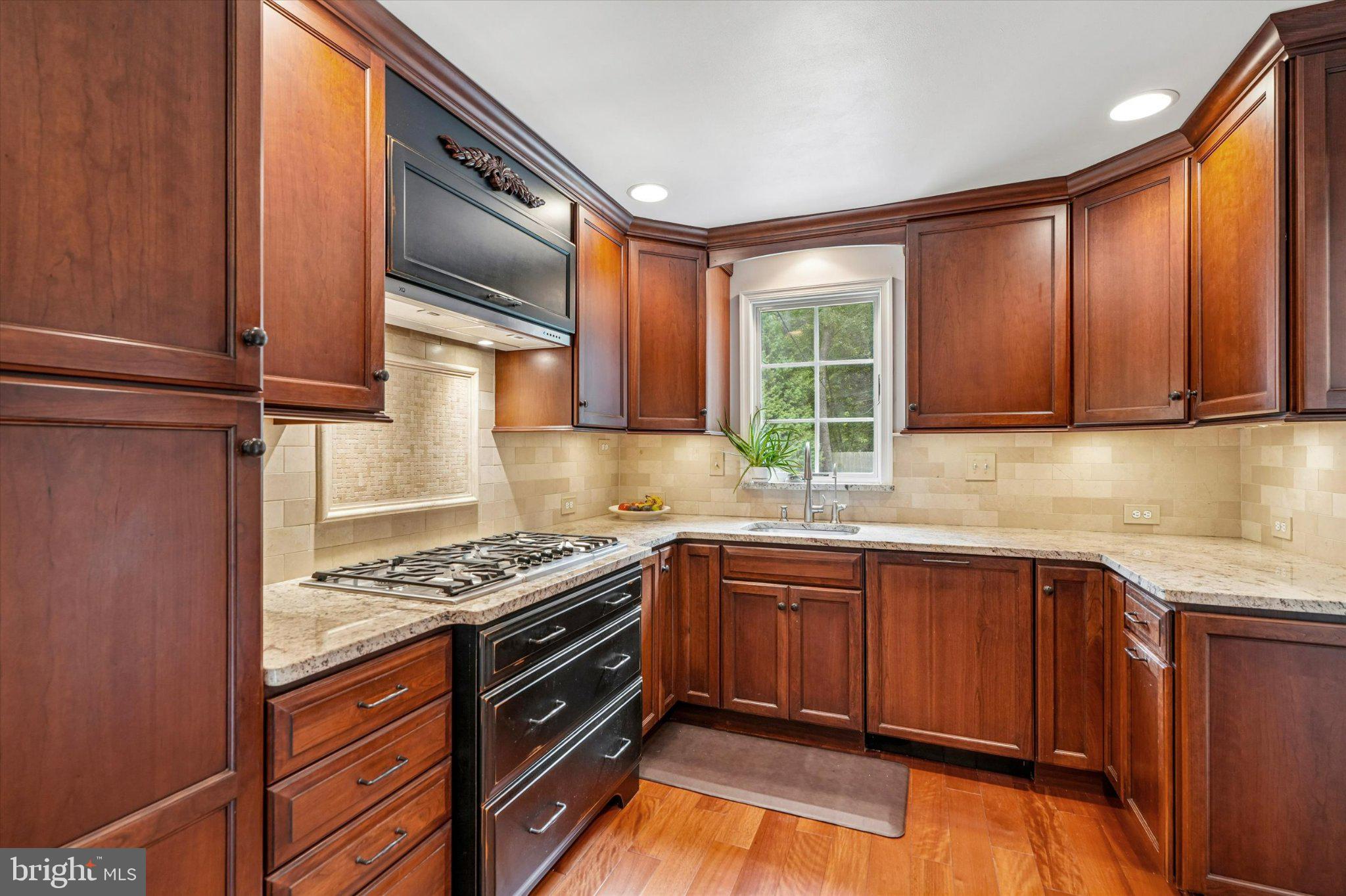 606 Upper Gulph Road Wayne, PA 19087 - Photo 9 of 34 Rich Cherry Cabinetry Creates a Warm Kitchen