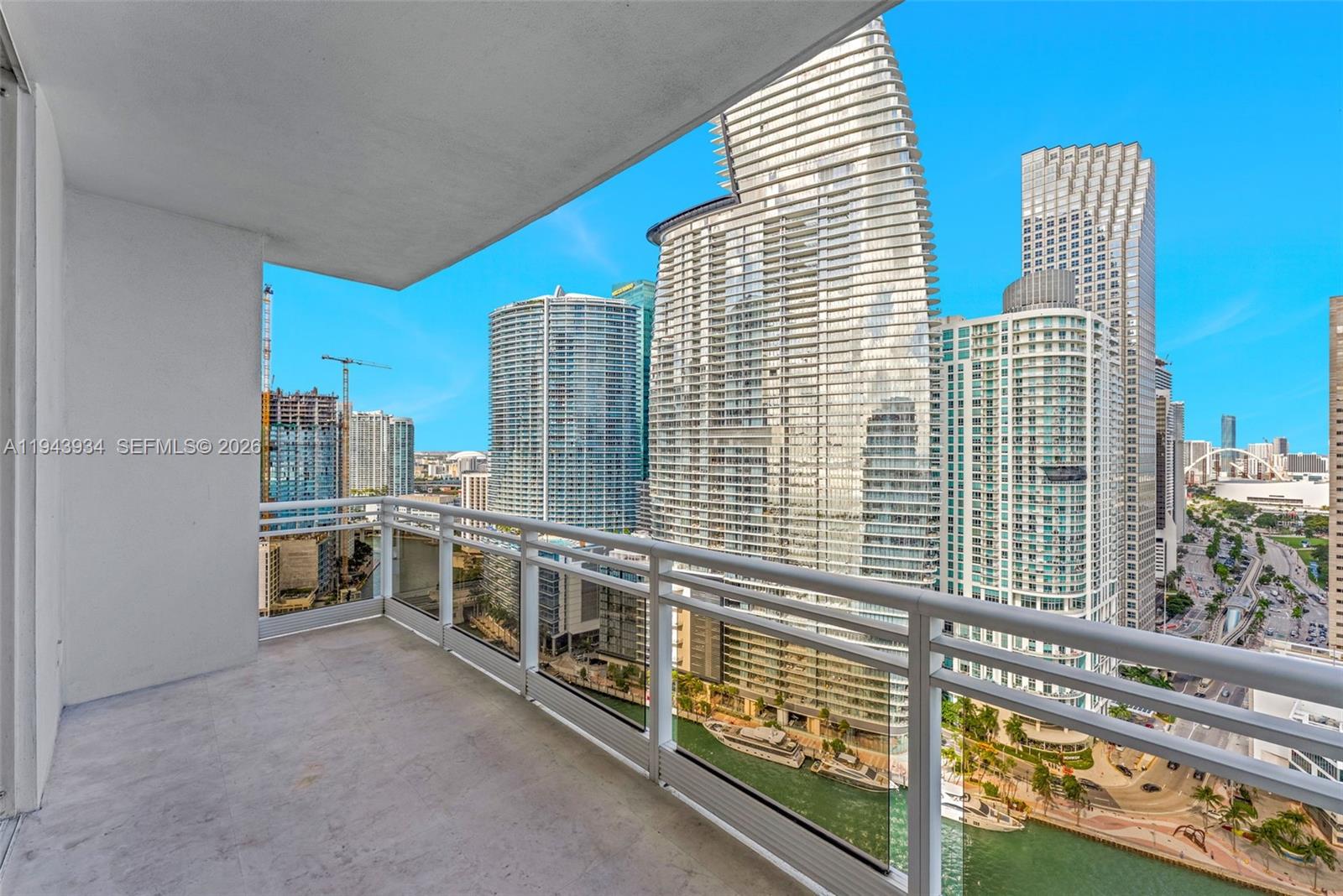 901 Brickell Key Boulevard, Unit 3206 Miami, FL 33131 - Photo 24 of 41 a view of a city from a balcony
