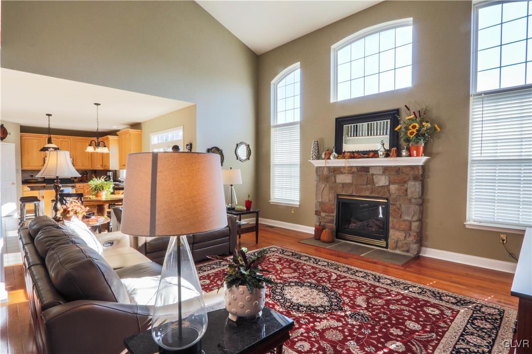 136 Starr Road Reading, PA 19608 - Photo 14 of 45 a living room with furniture a flat screen tv and a fireplace