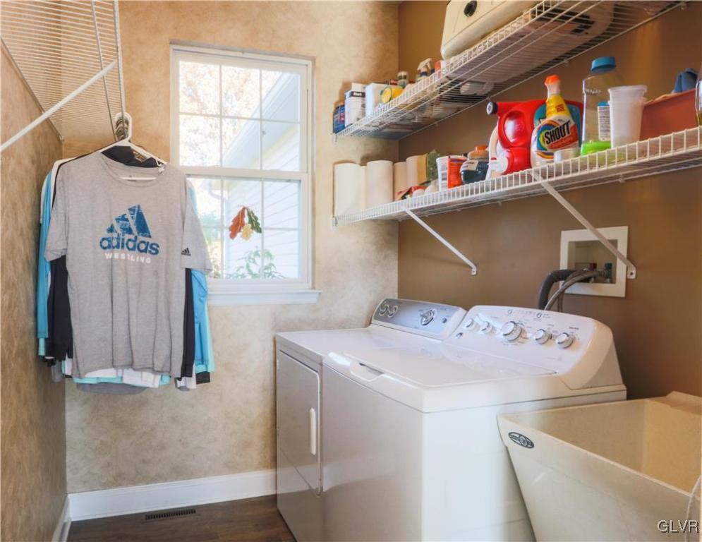136 Starr Road Reading, PA 19608 - Photo 15 of 45 a utility room with dryer and washer
