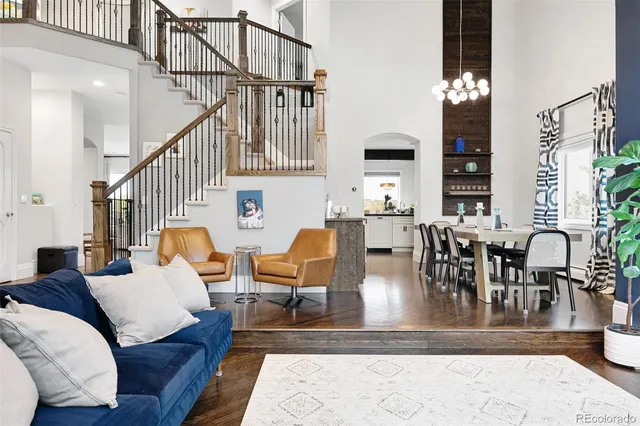 a kitchen with stainless steel appliances a sink and a refrigerator