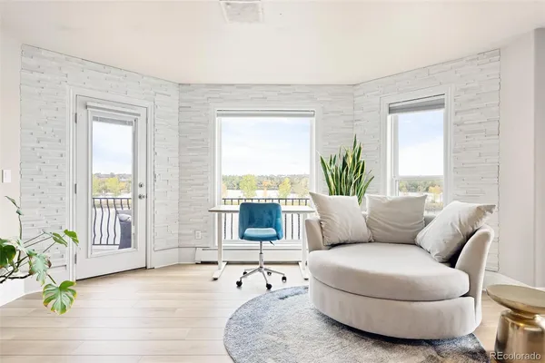 a view of multiple houses with a yard