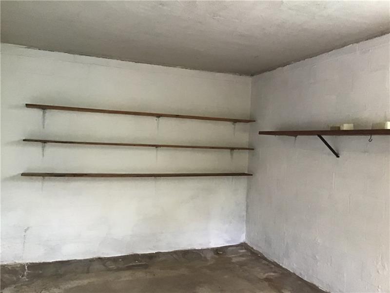 1606 Lafayette Road Pittsburgh, PA 15221 - Photo 24 of 25 Freshly painted garage with a powered garage door.