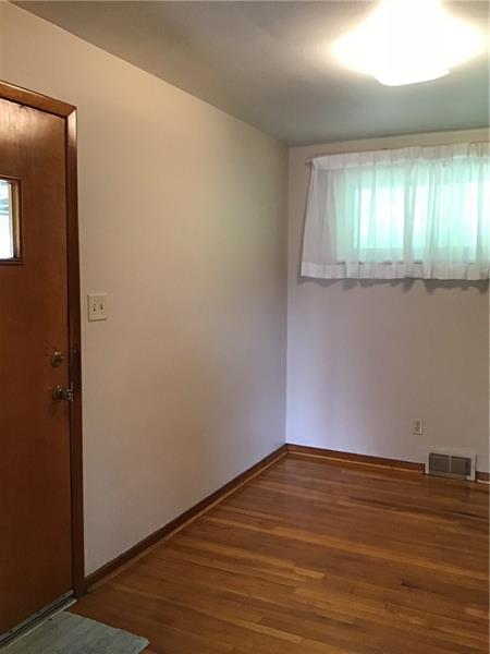 1606 Lafayette Road Pittsburgh, PA 15221 - Photo 7 of 25 The dining room features an open layout - great for entertaining.