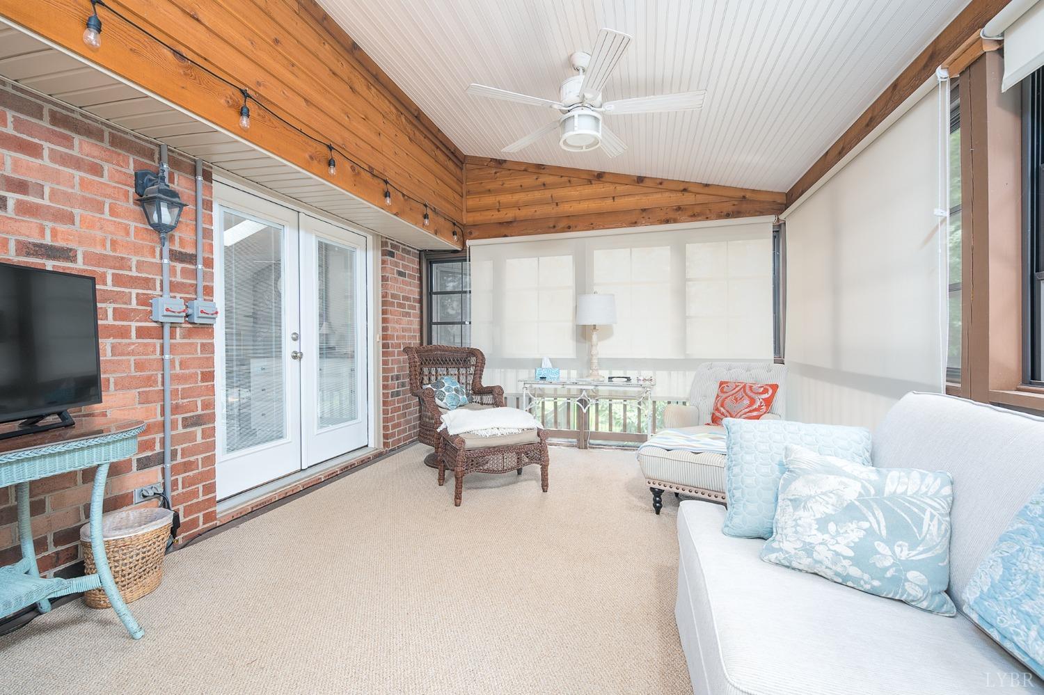 136 Guffey Terrace Lynchburg, VA 24502 - Photo 14 of 33 a living room with furniture and a flat screen tv