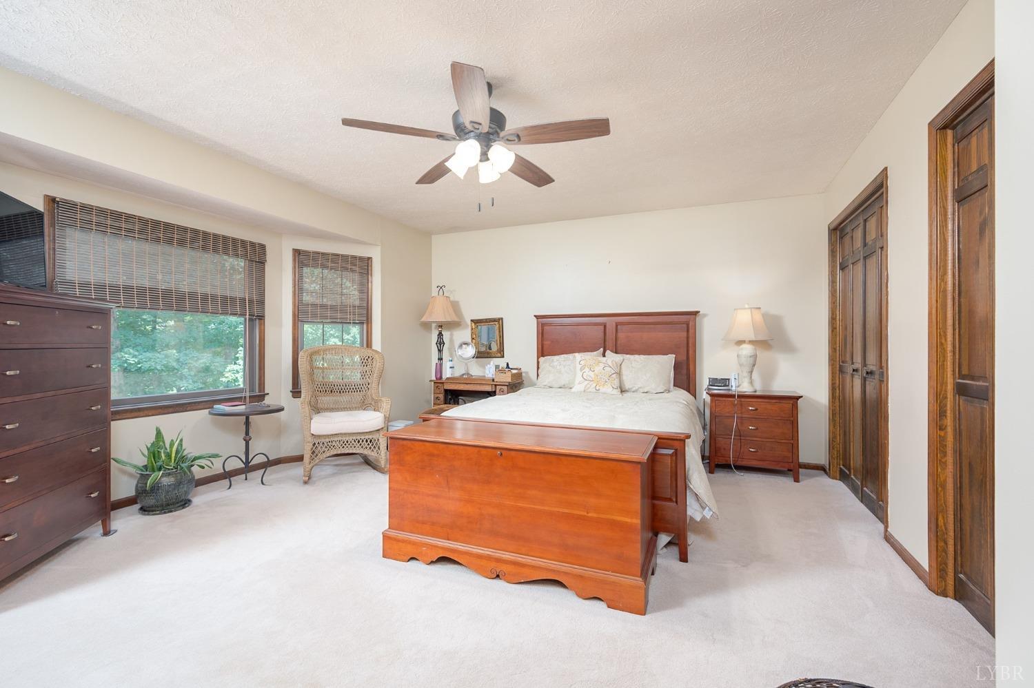 136 Guffey Terrace Lynchburg, VA 24502 - Photo 17 of 33 a bedroom with a bed and large window