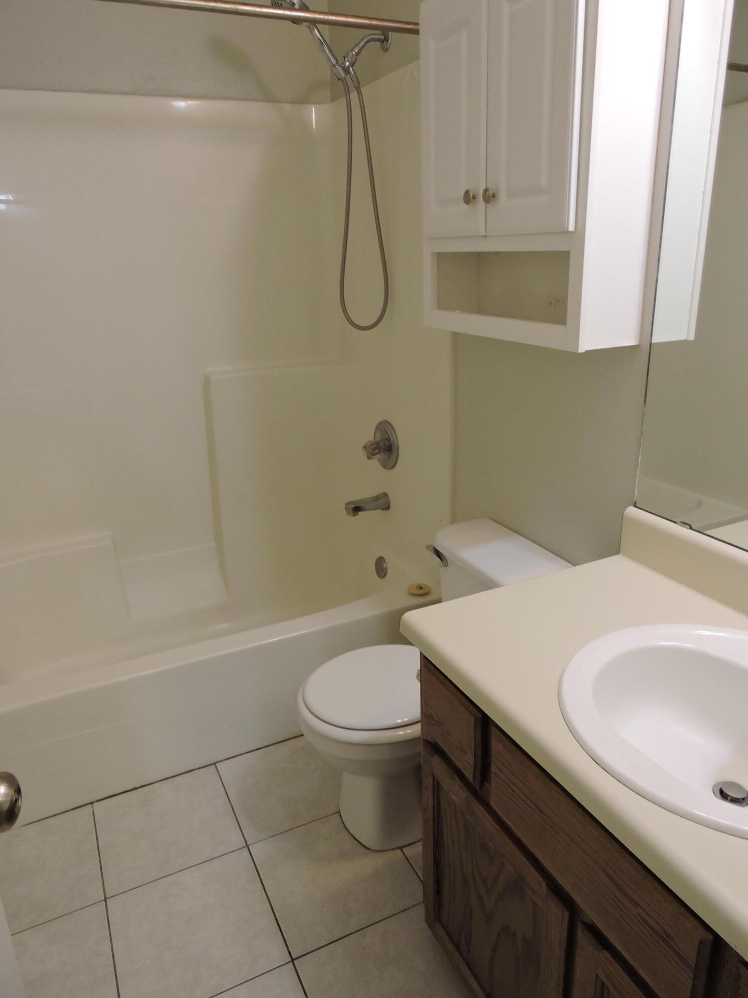 813 Valley Road Crestview, FL 32539 - Photo 14 of 18 a bathroom with a sink a toilet and shower