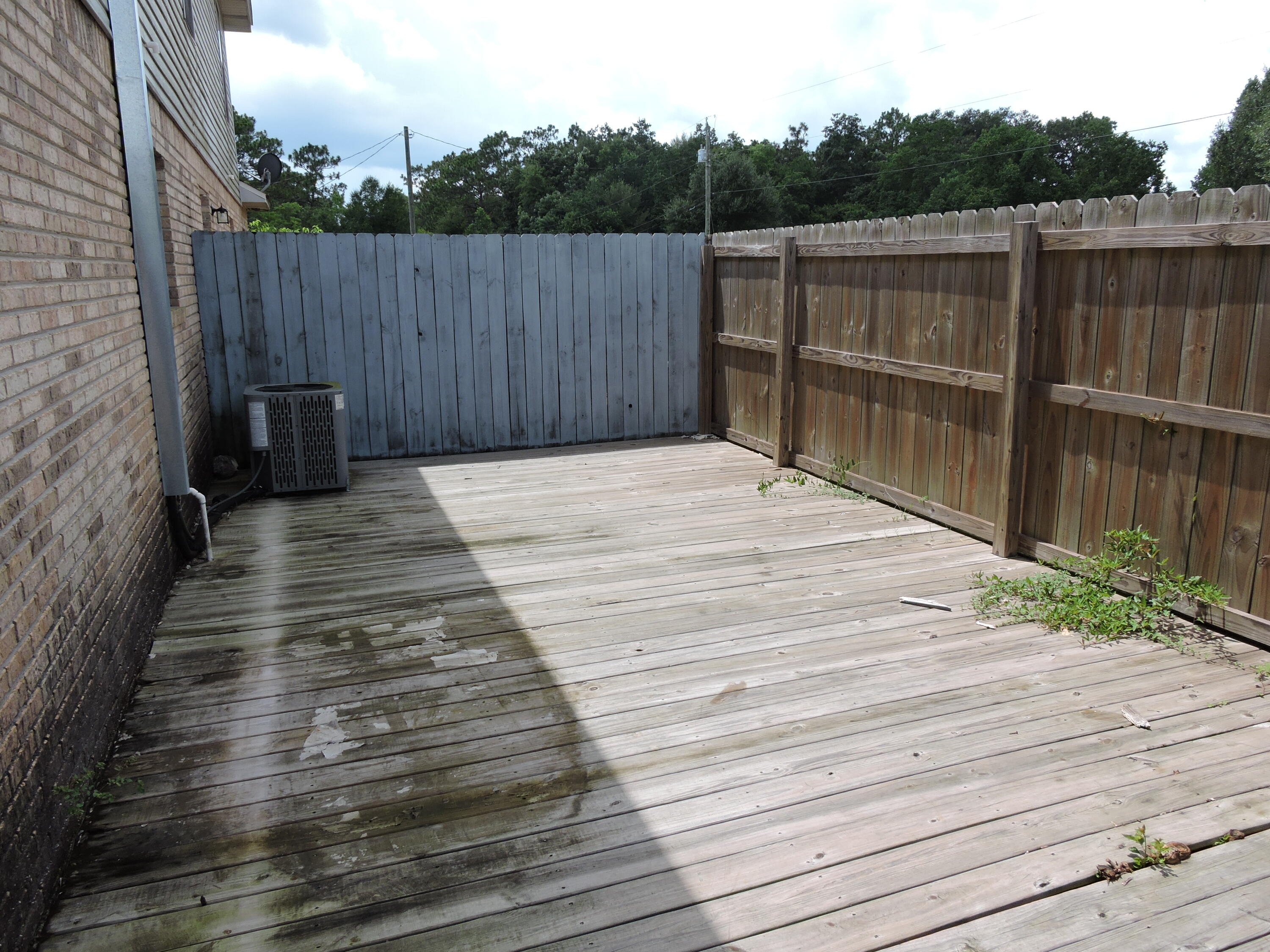 813 Valley Road Crestview, FL 32539 - Photo 17 of 18 a view of a backyard