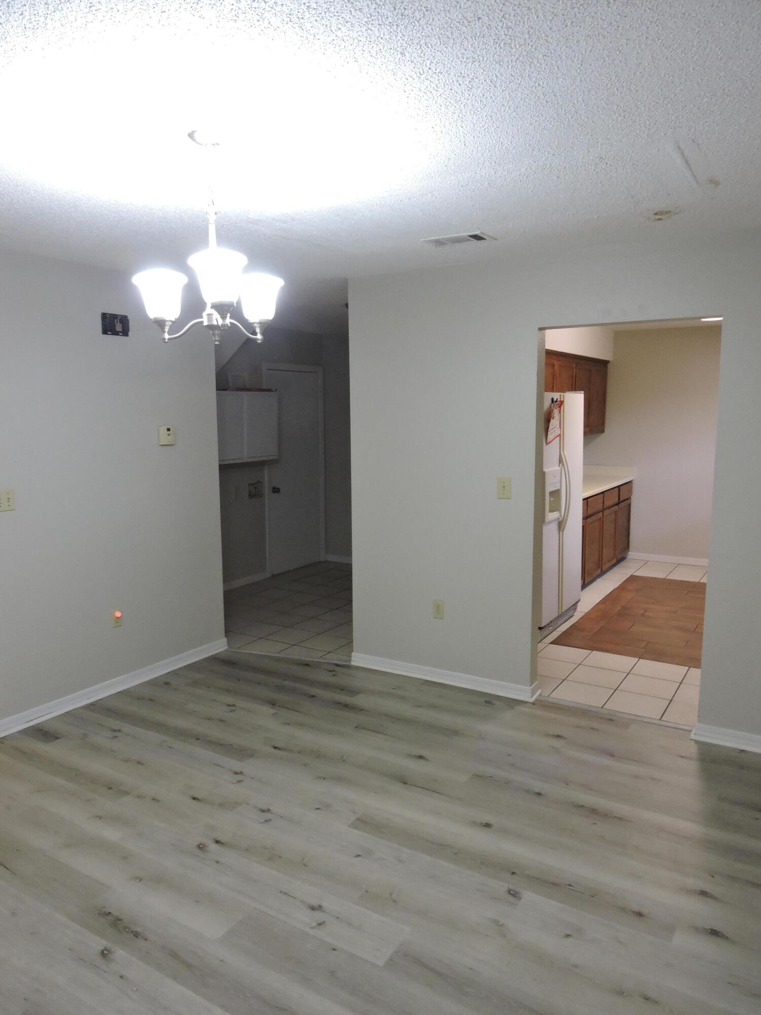813 Valley Road Crestview, FL 32539 - Photo 6 of 18 a view of a livingroom with wooden floor