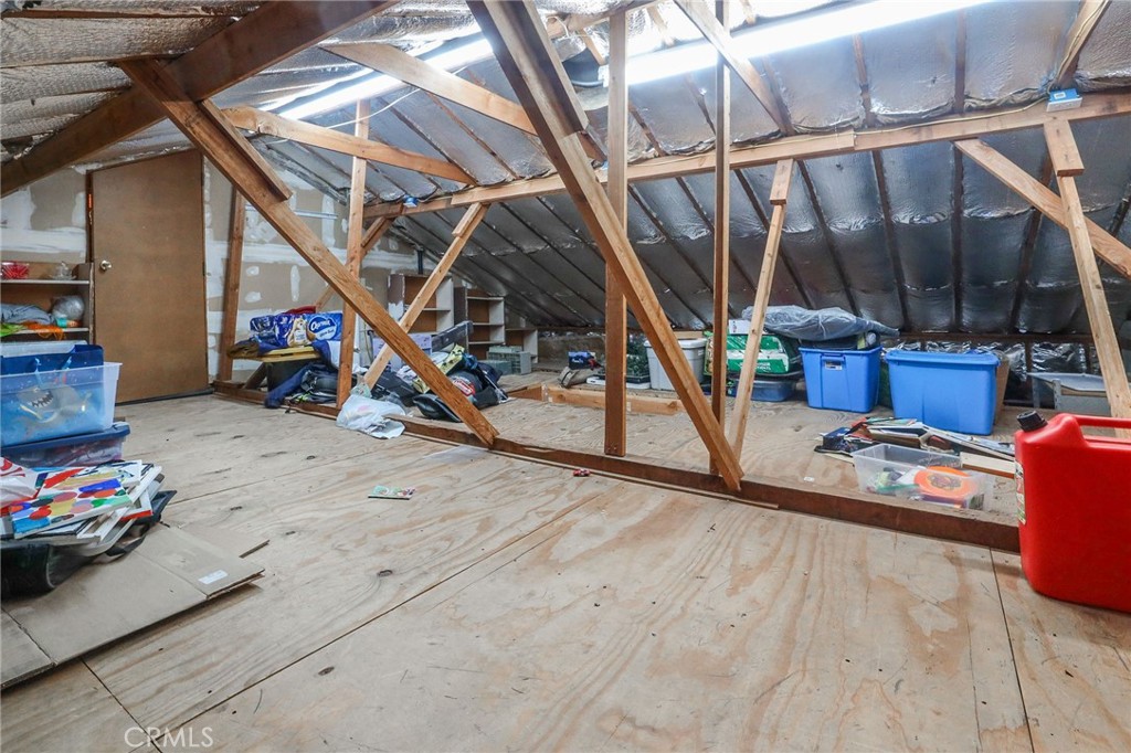 11731 Wembley Road Rossmoor, CA 90720 - Photo 32 of 51 a view of a garage with rack and bicycle