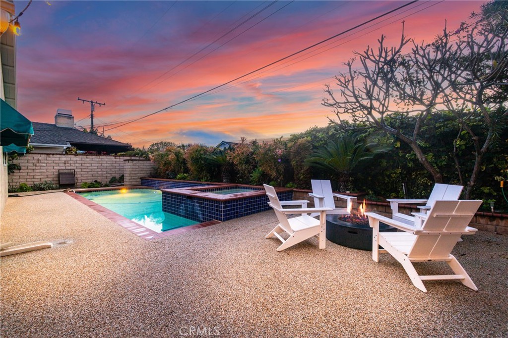 11731 Wembley Road Rossmoor, CA 90720 - Photo 39 of 51 a view of a backyard with sitting area