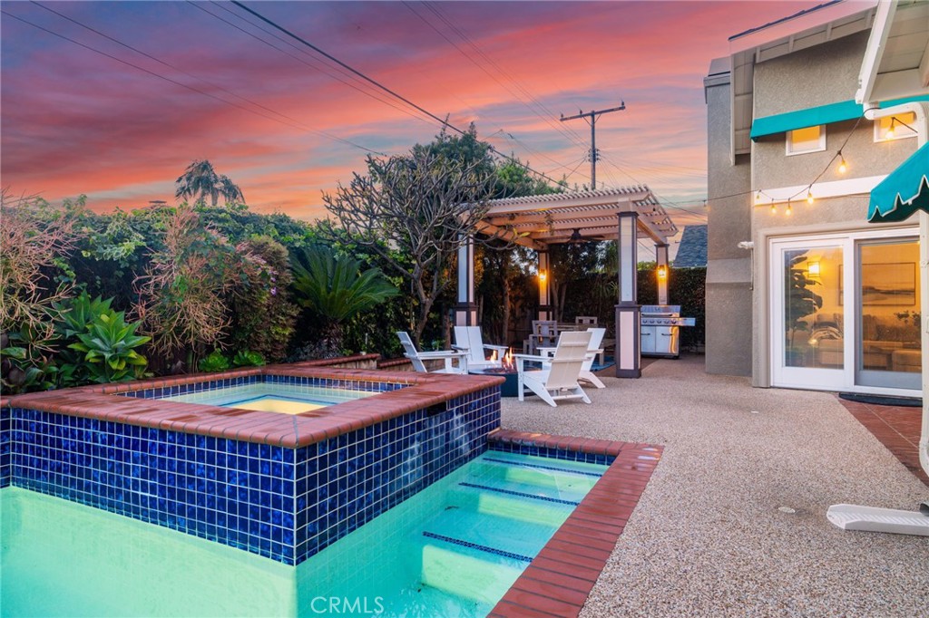 11731 Wembley Road Rossmoor, CA 90720 - Photo 40 of 51 a view of a backyard with sitting area and furniture