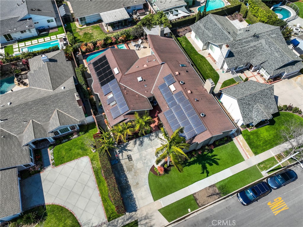 11731 Wembley Road Rossmoor, CA 90720 - Photo 45 of 51 an aerial view of a house with a yard and garden