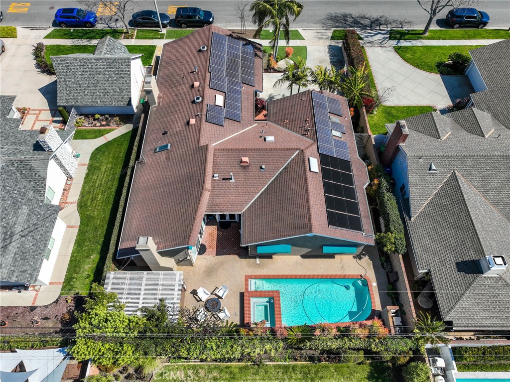 11731 Wembley Road Rossmoor, CA 90720 - Photo 48 of 51 an aerial view of a house with a swimming pool