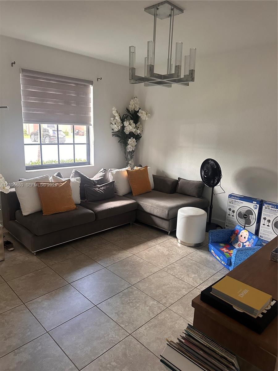 8867 West 35th Way Hialeah, FL 33018 - Photo 6 of 15 a living room with furniture