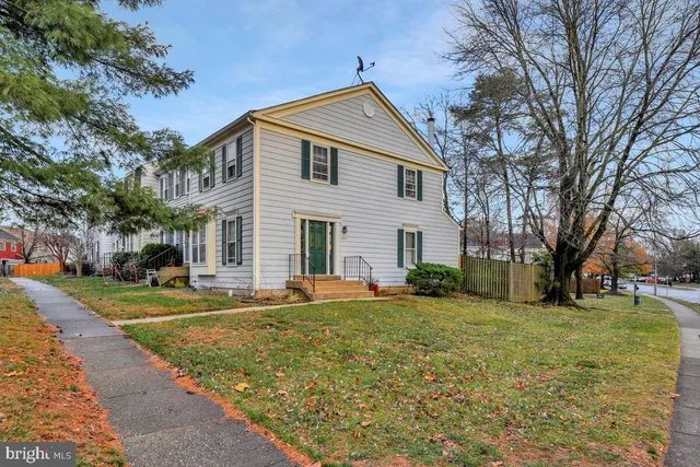 a bathroom with a toilet a sink and shower