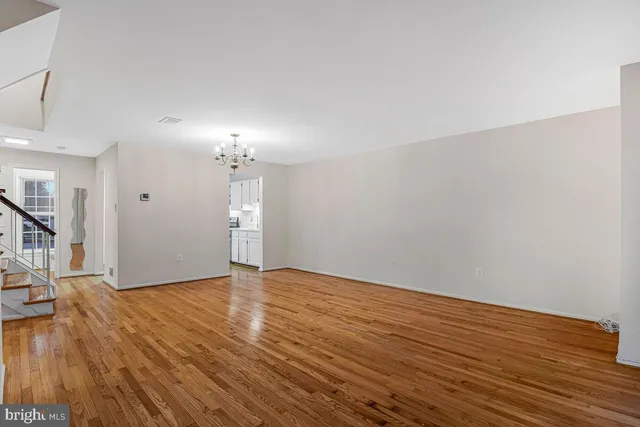 a bathroom with a sink mirror and vanity