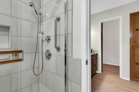 a view of a bathroom with a glass door