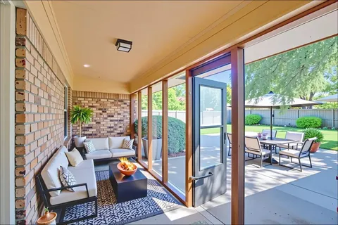 a outdoor living space with furniture and garden view
