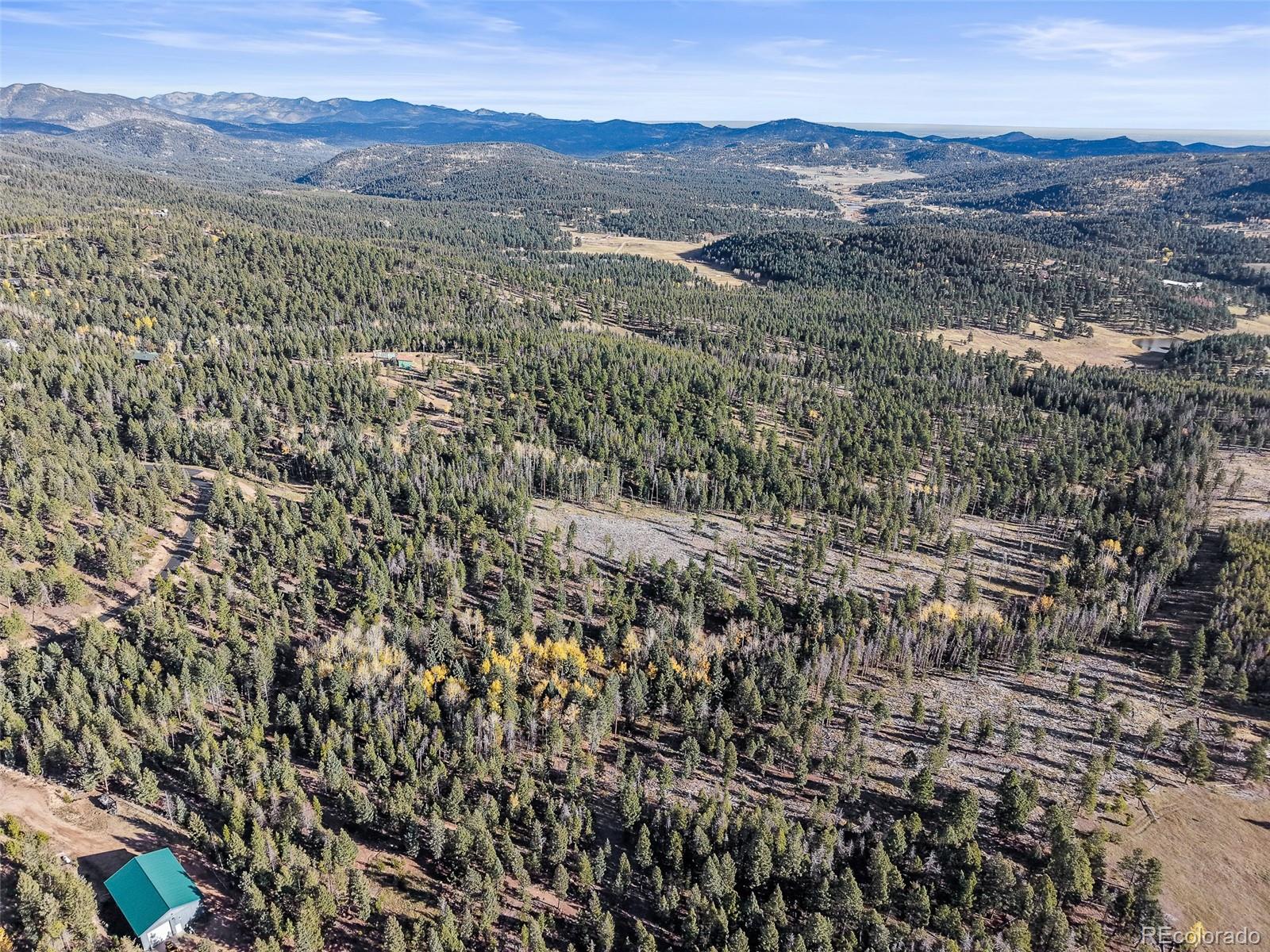 9606 Wallow Court Conifer, CO 80433 - Photo 24 of 27 a view of mountain view with mountains in the background