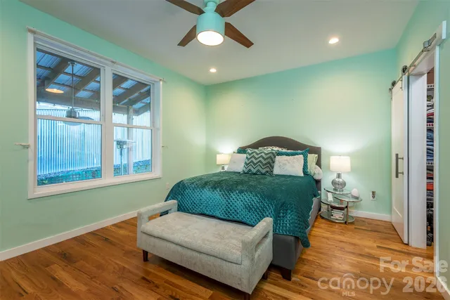a bathroom with a toilet a sink and a shower
