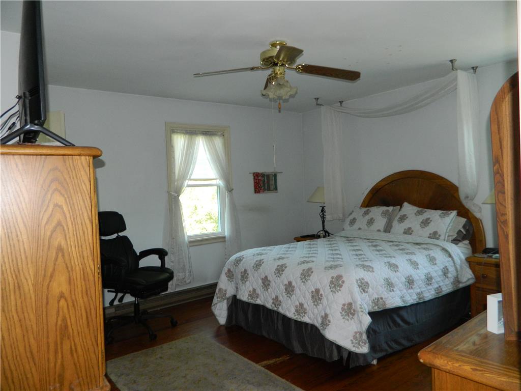 2130 Huntington Street Bethlehem, PA 18017 - Photo 16 of 23 Hardwood floors and a bright window frame this naturally illuminated sleeping space.