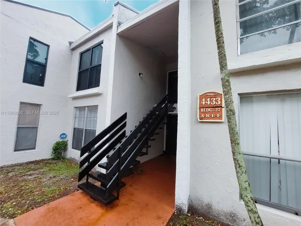 a view of an entryway with a front door