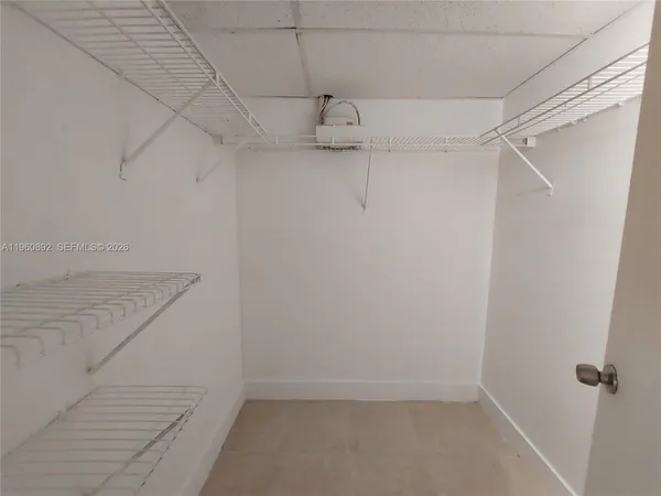 a view of a room with racks on the wall