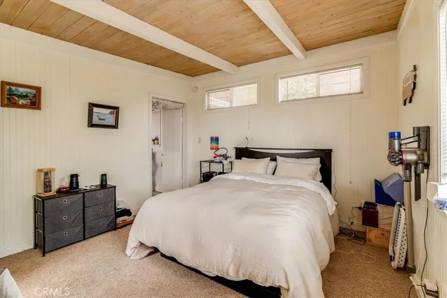 a view of a white building among the ocean