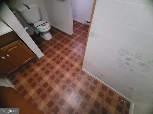 a bathroom with a sink and a toilet