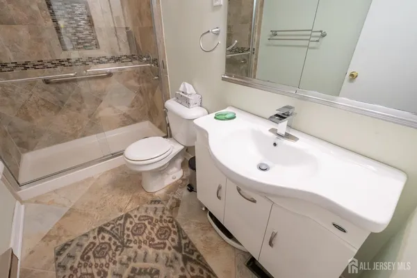 a bathroom with a sink and a toilet