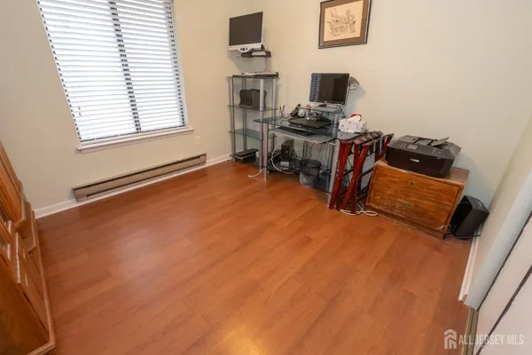 a workspace with furniture and a window