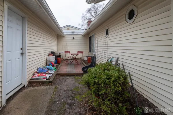 a backyard of a house with seating space
