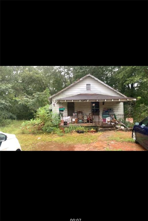 4623 Highway 212 Covington, GA 30016 - Photo 1 of 1 a front view of house with yard swimming pool and outdoor seating