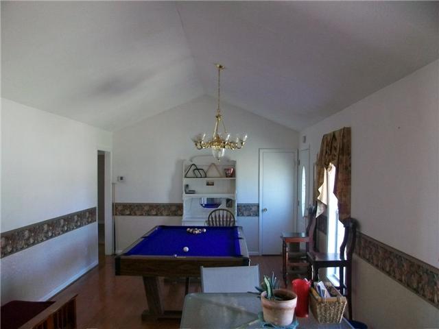 7579 South Swift Road Goodlettsville, TN 37072 - Photo 7 of 8 Living Room 26x12 large enough for your pool table!