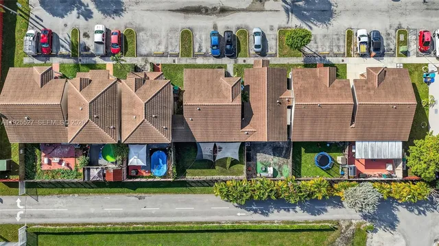 a view of people sitting in front of retail shop