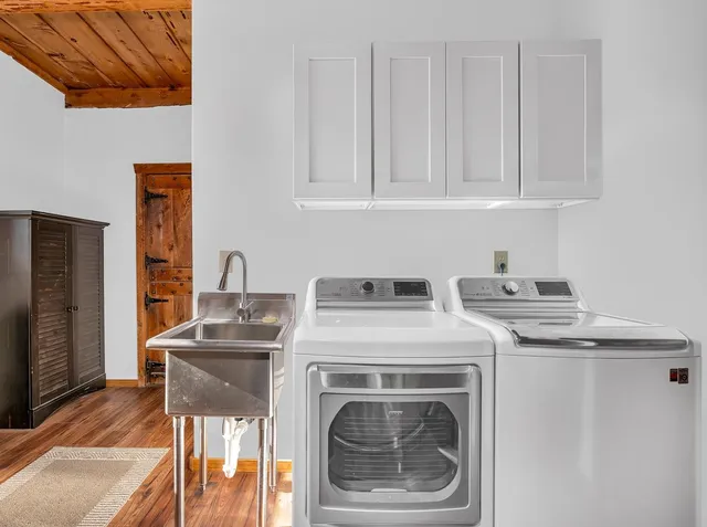 a utility room with dryer and washer