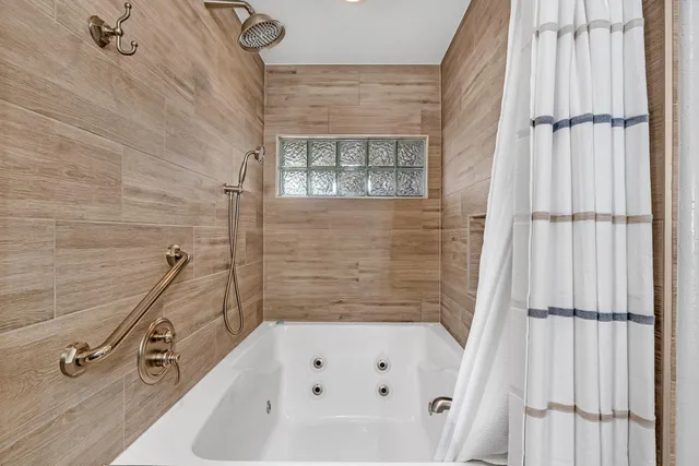 a bathroom with a bathtub