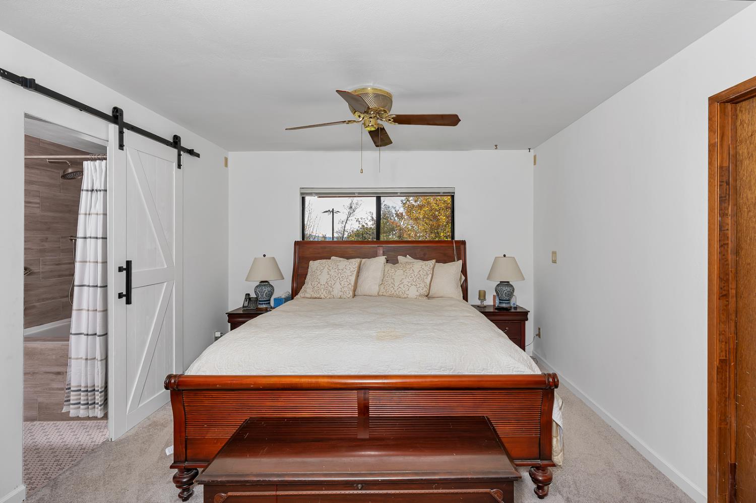 47515 Bissett Station Road Oakhurst, CA 93644 - Photo 50 of 59 a bedroom with a bed and window