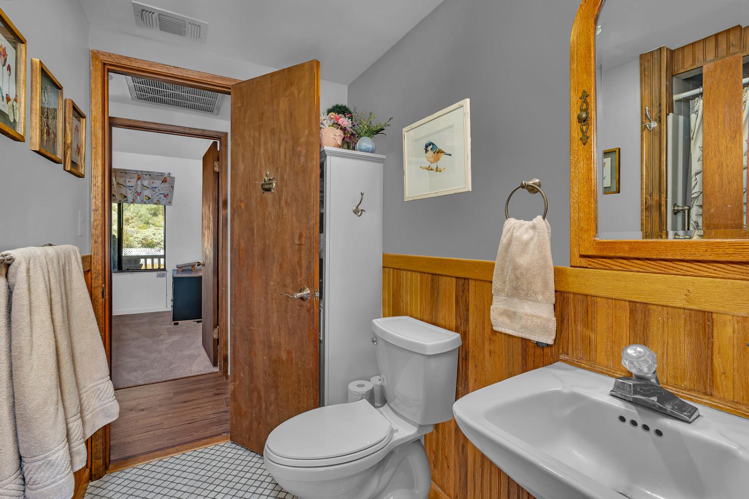 47515 Bissett Station Road Oakhurst, CA 93644 - Photo 57 of 59 a bathroom with a sink a toilet and shower