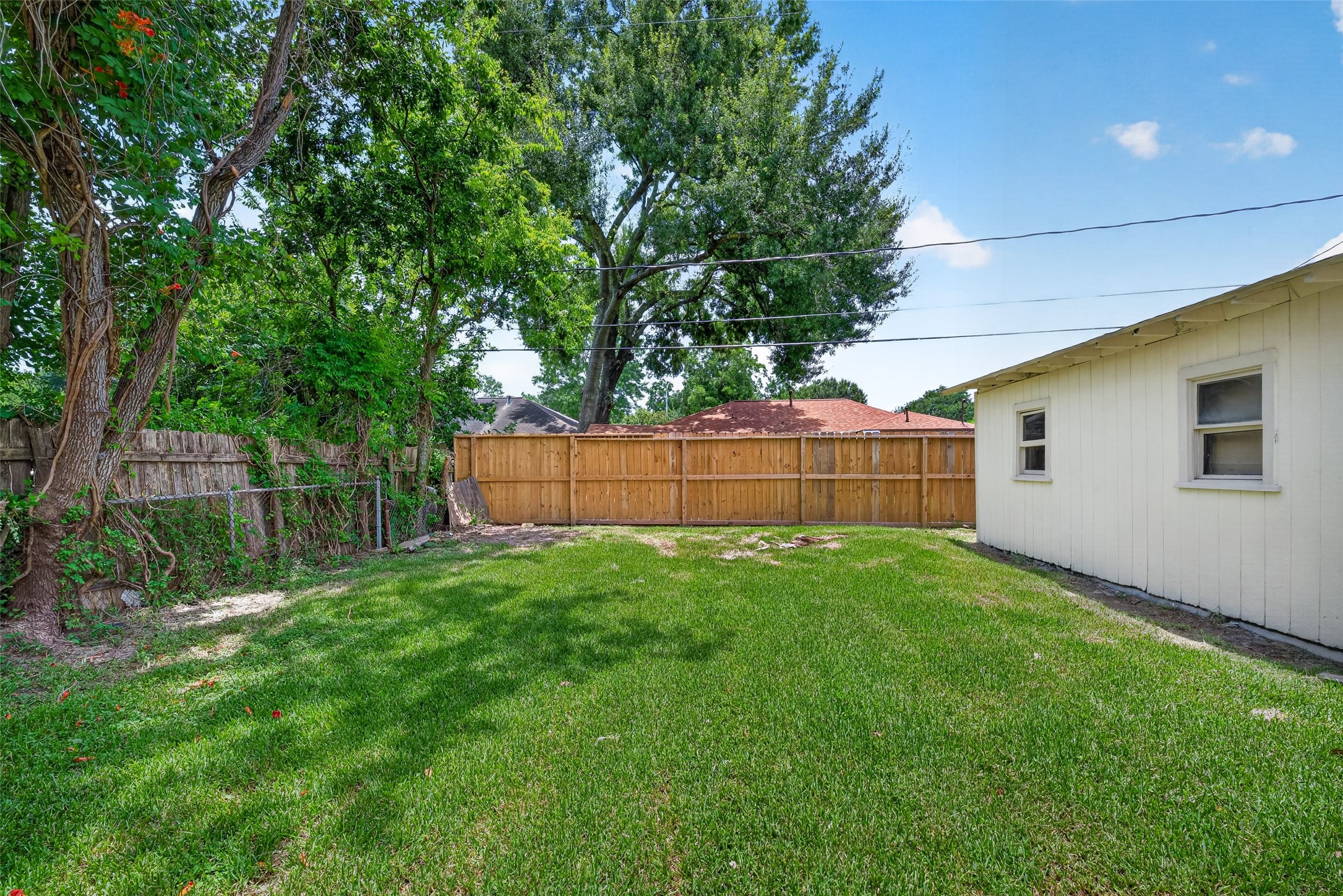 3218 Grant Street Pasadena, TX 77503 - Photo 22 of 26 Backyard with some additional storage space here.