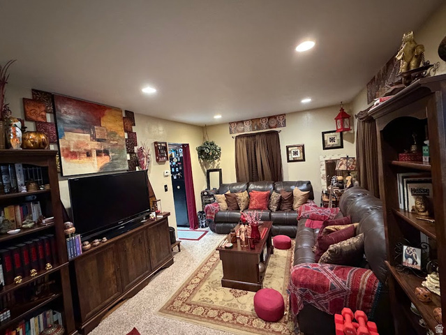 737 Wasatch Street Midvale, UT 84047 - Photo 14 of 29 Open living area featuring recessed lighting, a built-in media console, and an adjacent built-in bookcase