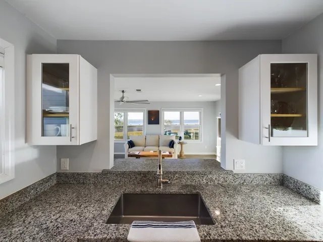 a living room with furniture and window