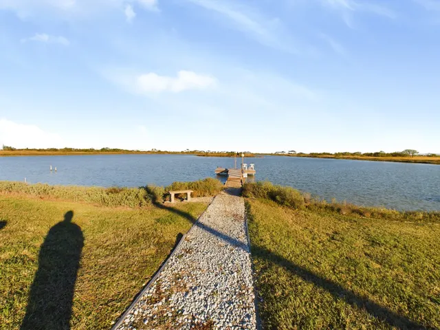 a view of a lake and outdoor space
