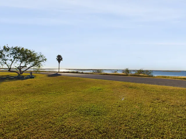 a view of an ocean and a city