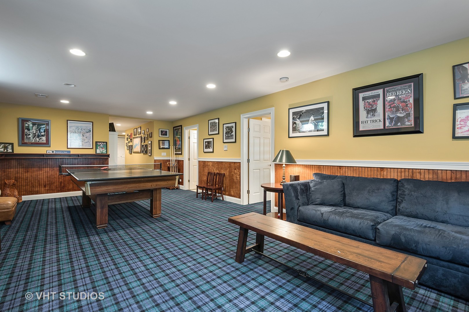 1353 Tower Road Winnetka, IL 60093 - Photo 22 of 33 a living room with furniture a table and kitchen view