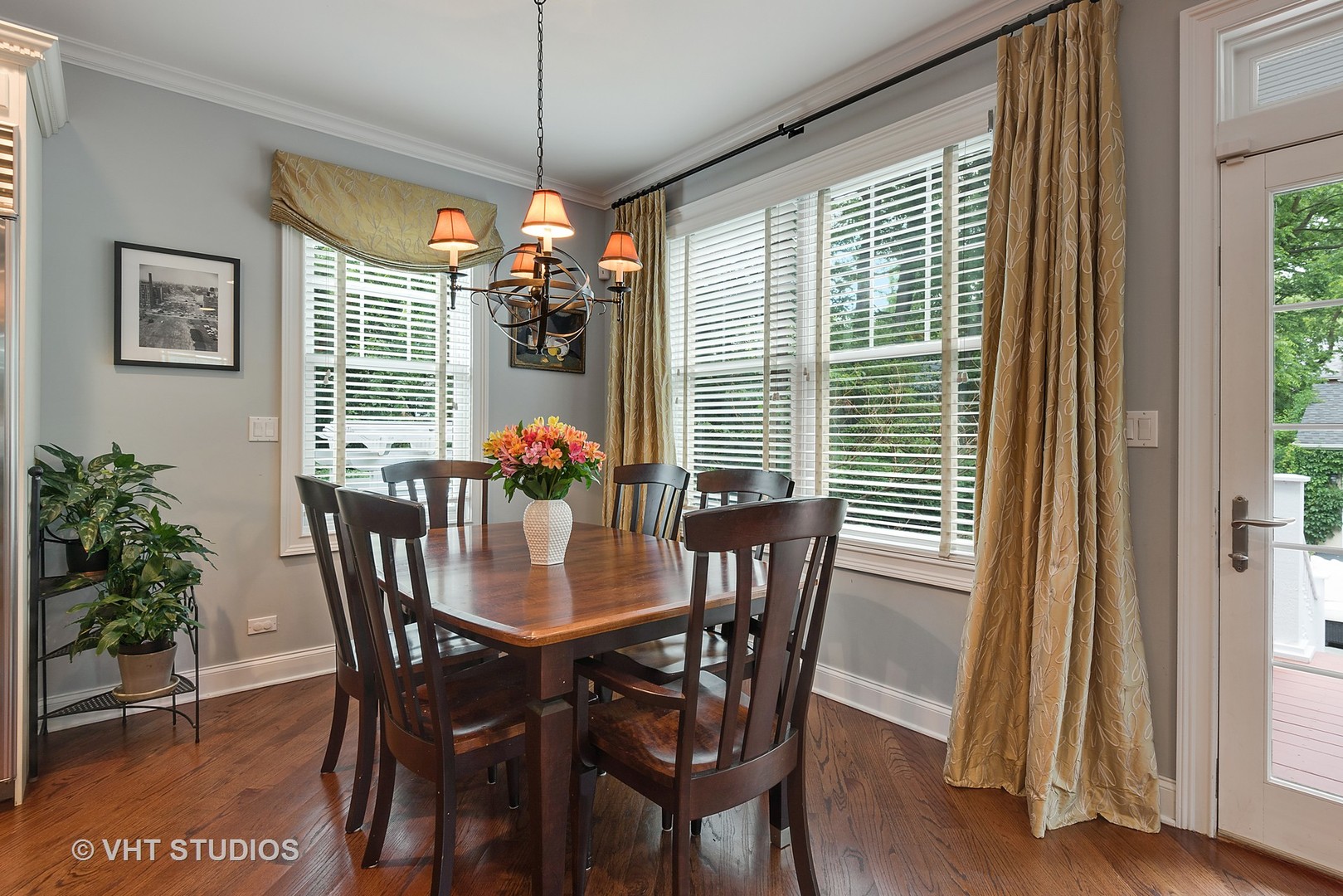 1353 Tower Road Winnetka, IL 60093 - Photo 8 of 33 a view of a dining room with furniture and window