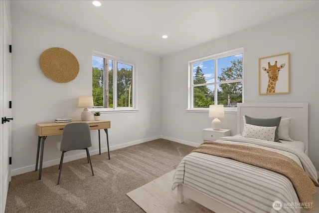 a bathroom with a sink toilet a shower and a mirror